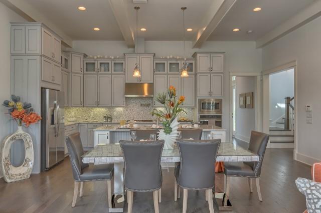 158 Clipper Street, Unit 85 Inlet Beach, FL 32461 - Photo 12 of 12 a view of a dining room with furniture and wooden floor