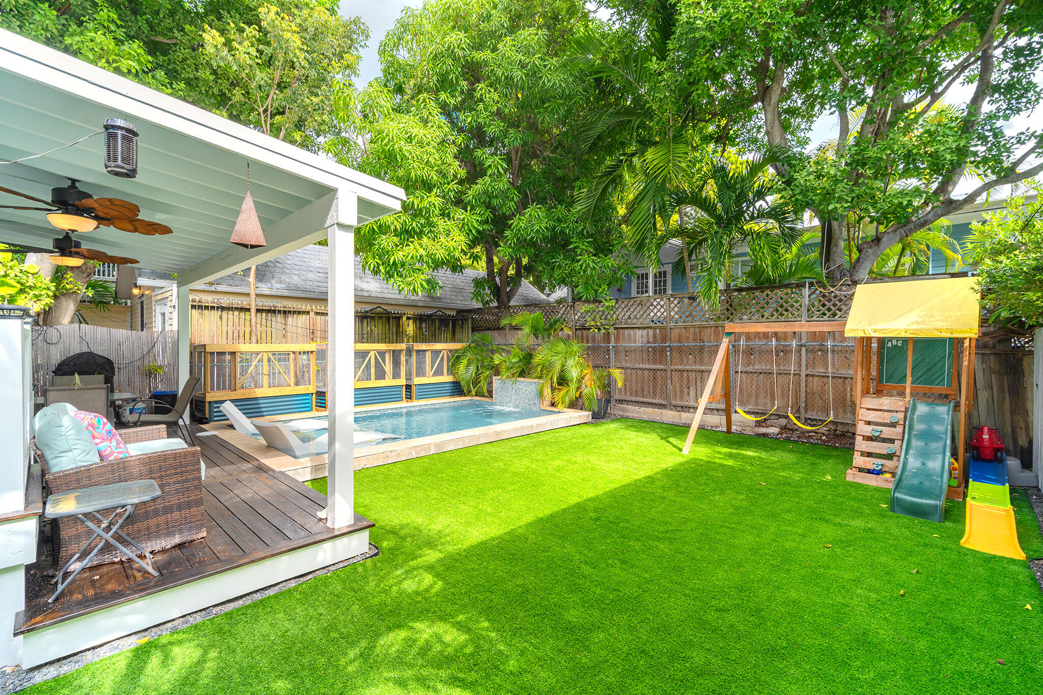 529 Simonton Street Key West, FL 33040 - Photo 56 of 81 a view of a house with a backyard and a patio