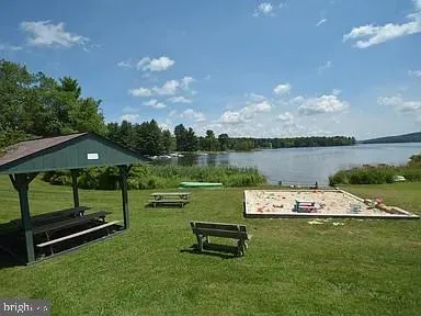 a view of a lake with a big yard