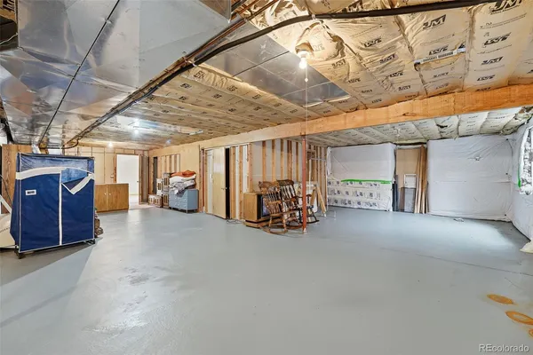 a view of a garage with furniture