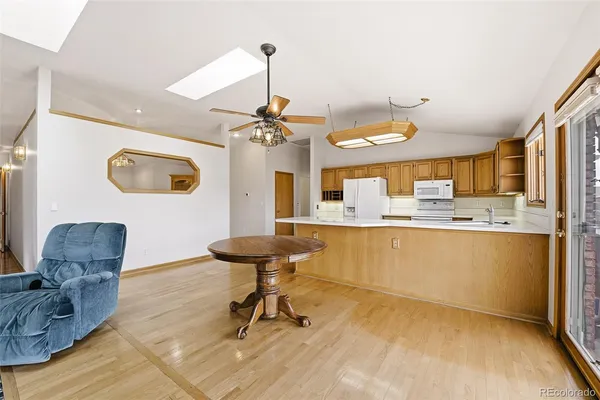 a kitchen with a sink cabinets and window