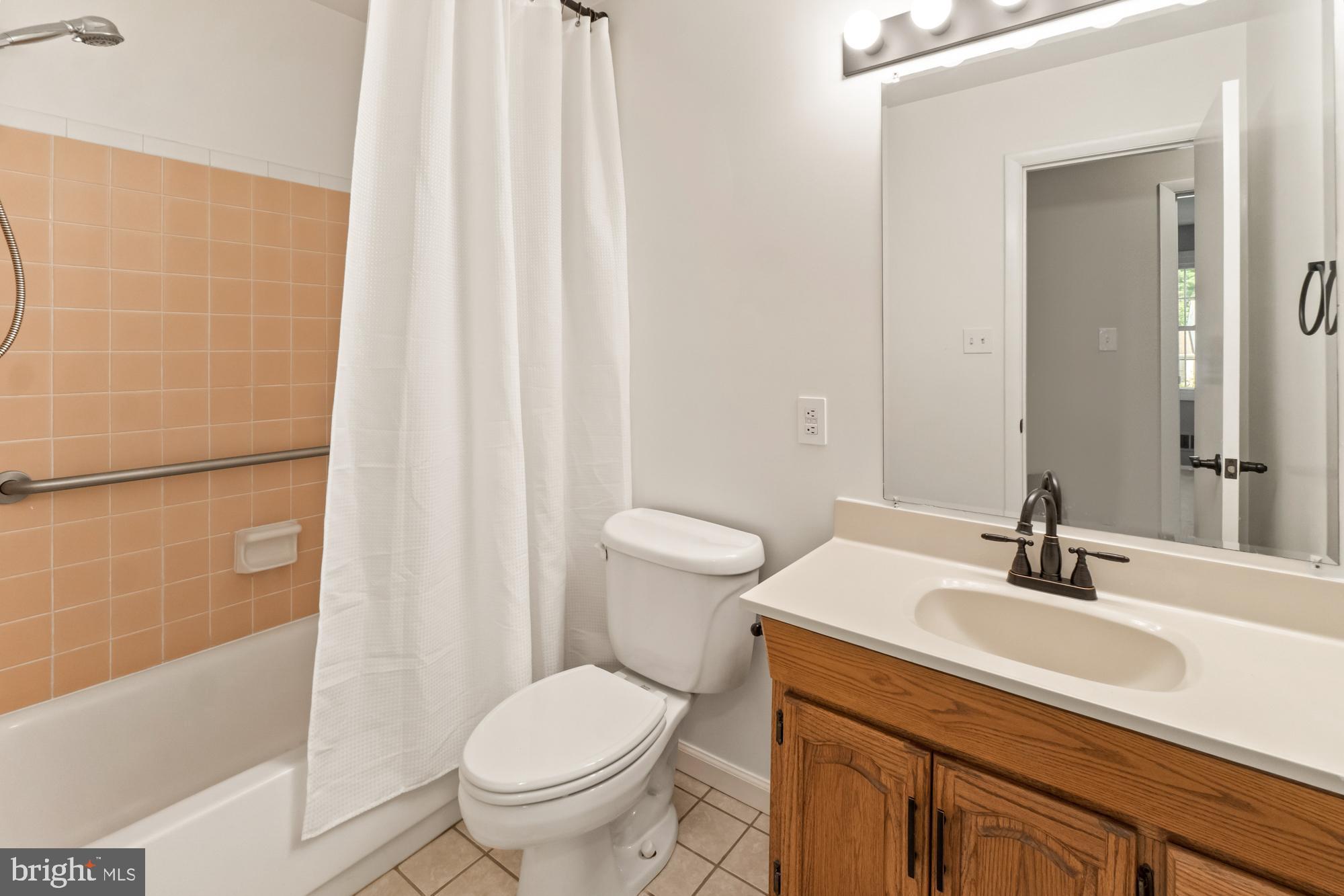 17336 Fletchall Road Poolesville, MD 20837 - Photo 34 of 55 Full hall bath upstairs