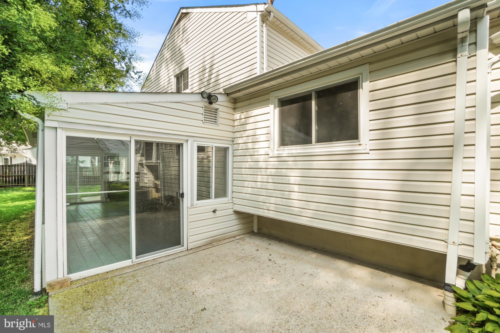 17336 Fletchall Road Poolesville, MD 20837 - Photo 8 of 55 Patio off of four-season enclosed sunroom