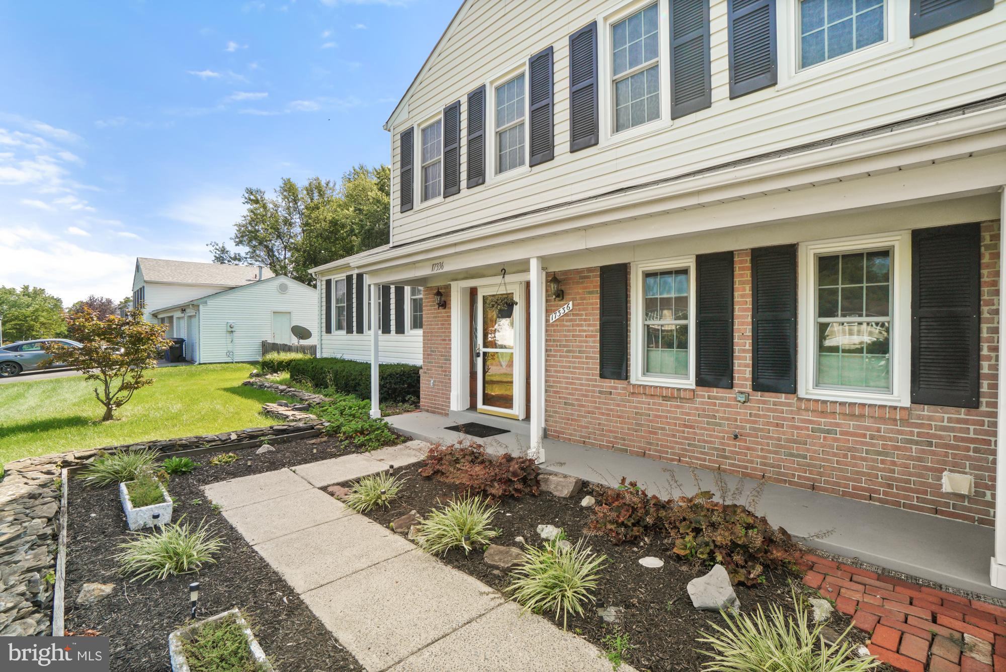 17336 Fletchall Road Poolesville, MD 20837 - Photo 10 of 55 Low maintenance landscaping and covered porch
