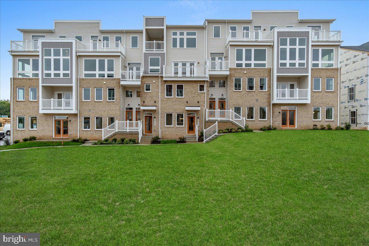 709 Iron Frg Road, Unit A Frederick, MD 21702 - Photo 1 of 15 a view of building with yard and garden