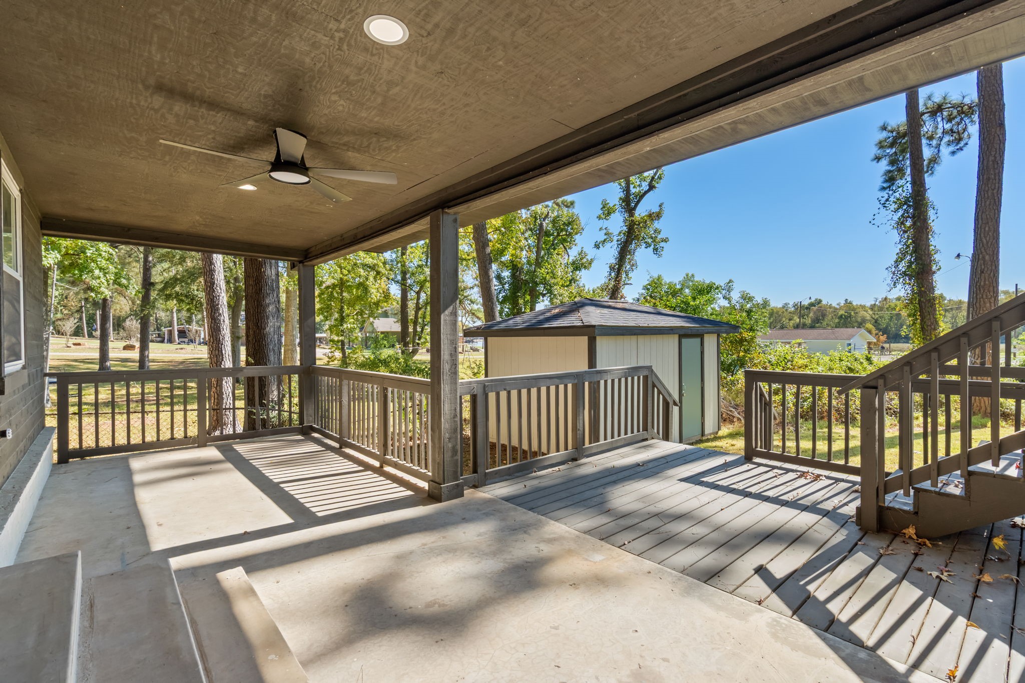 284 Hackberry Street Trinity, TX 75862 - Photo 14 of 42 Gorgeous water views, updated lighting, and ceiling fan.