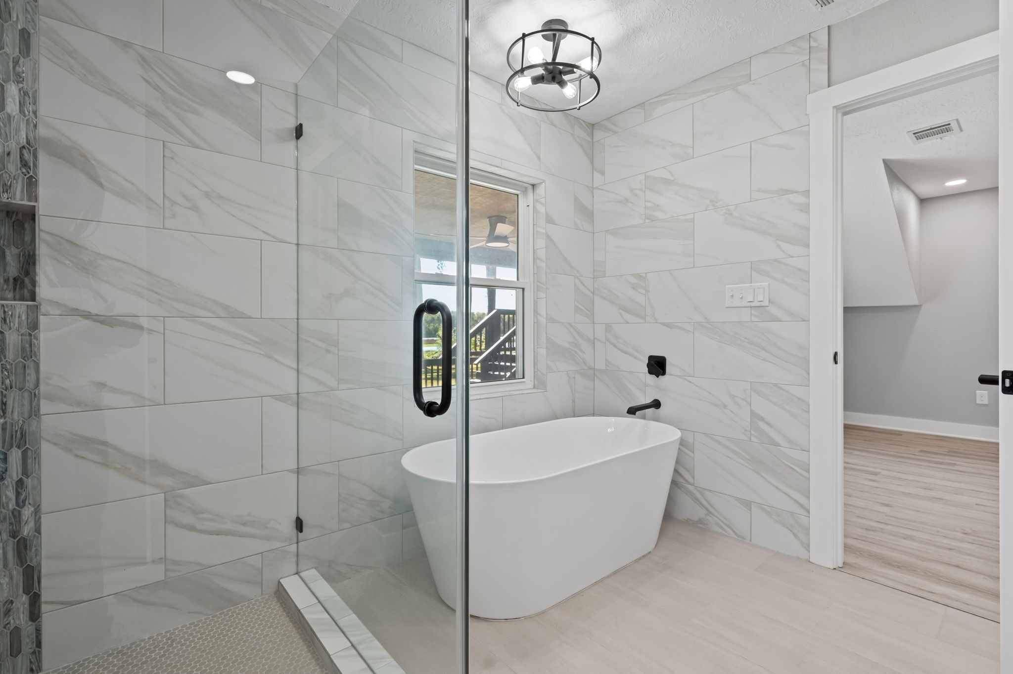 284 Hackberry Street Trinity, TX 75862 - Photo 16 of 42 The wall-mount tub spout adds a luxurious design detail.