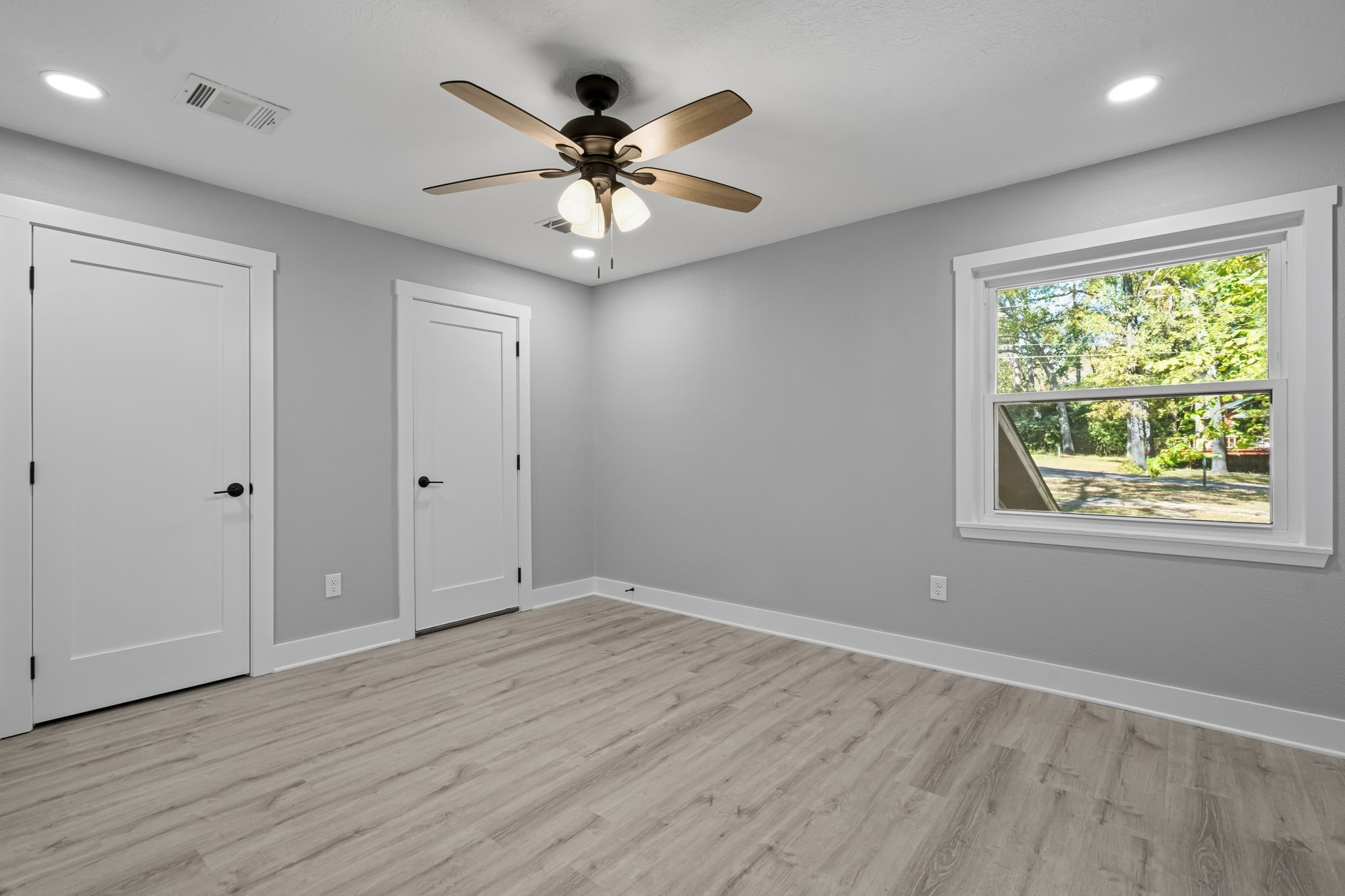 284 Hackberry Street Trinity, TX 75862 - Photo 25 of 42 One upstairs bedroom features an en-suite bathroom.