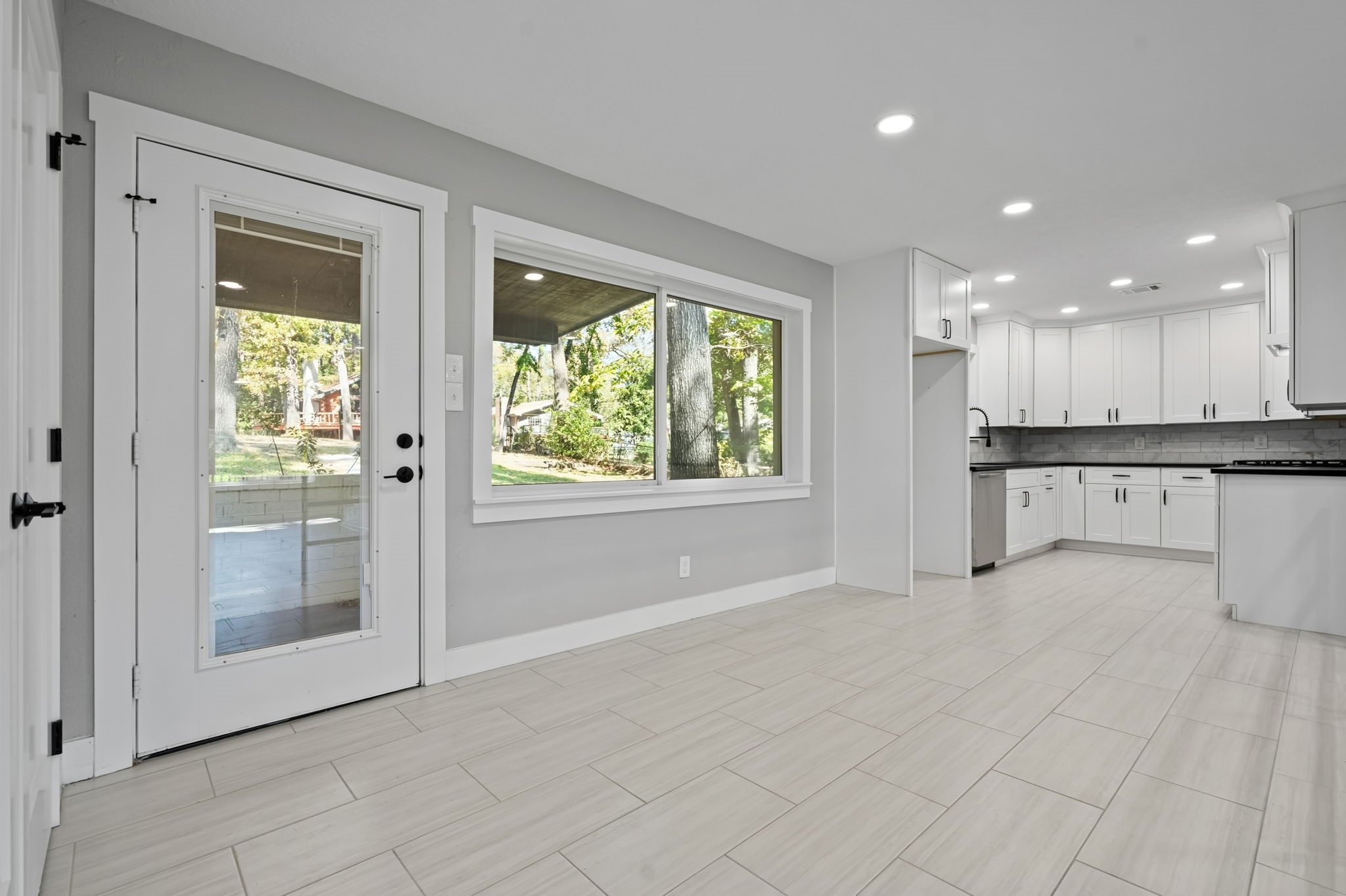 284 Hackberry Street Trinity, TX 75862 - Photo 3 of 42 a view of an empty room with a kitchen