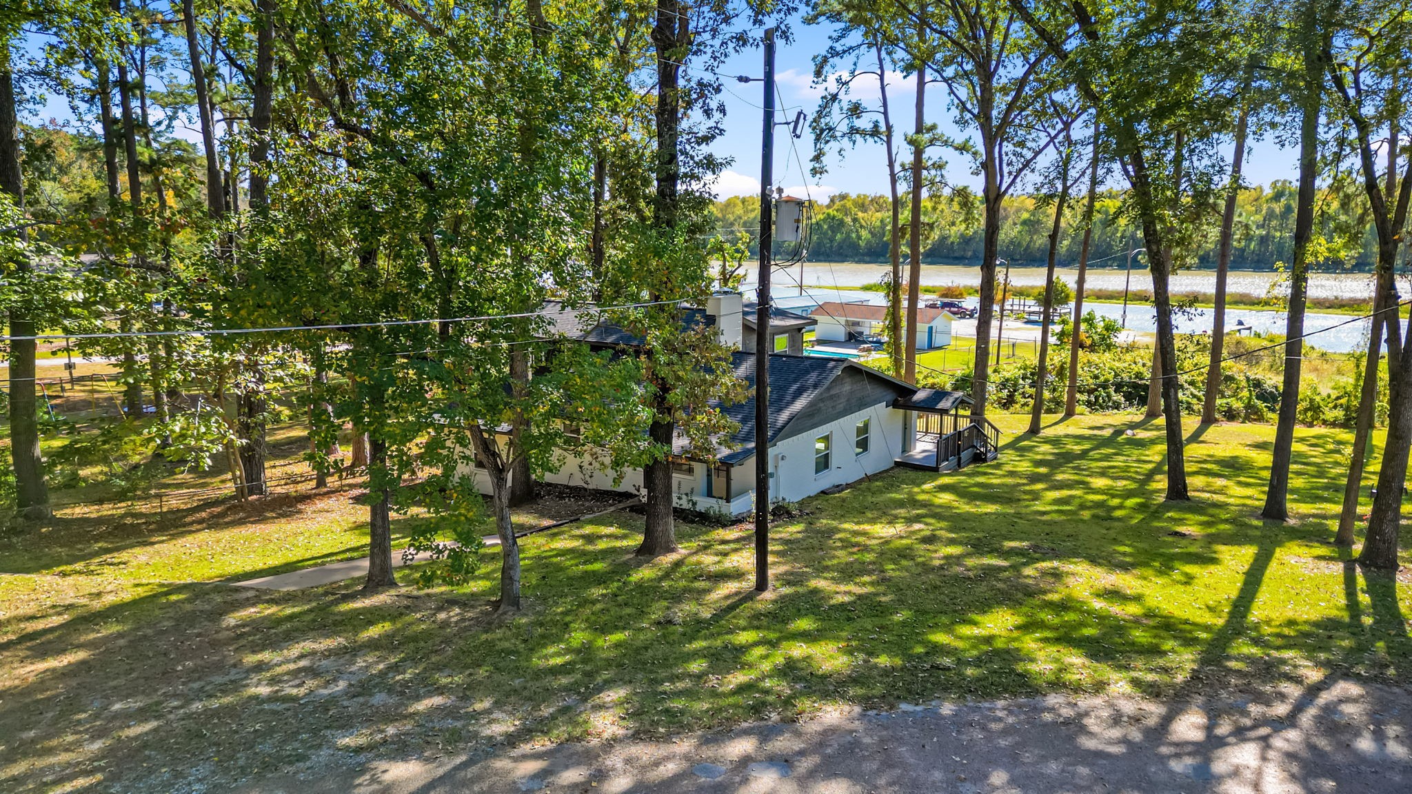 284 Hackberry Street Trinity, TX 75862 - Photo 32 of 42 a view of an outdoor space and swimming pool