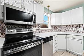 8951 Stevens Street Taylor, MI 48180 - Photo 14 of 32 BUILT-IN STAINLESS STEEL MICROWAVE!