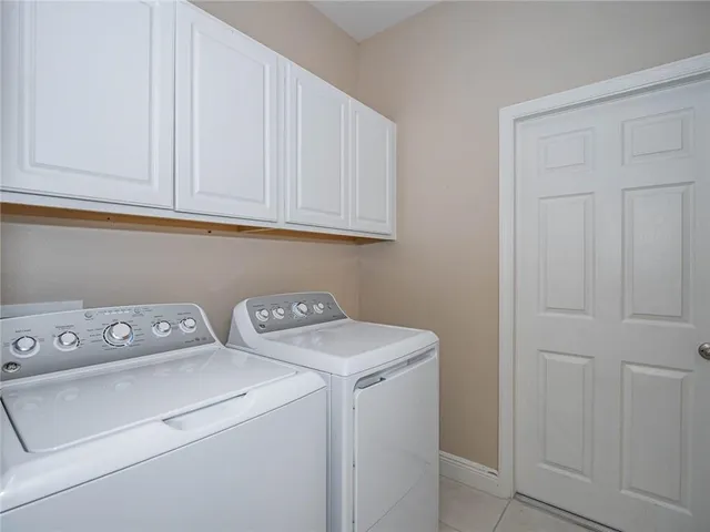 a house view with a backyard space