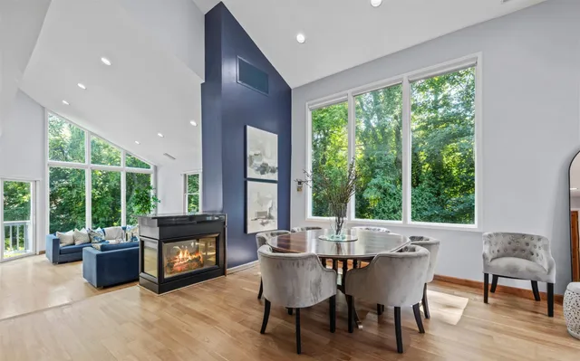 a view of a dining room with furniture window and outside view