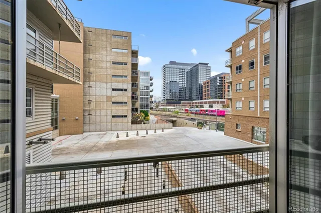 a view of a balcony with city view