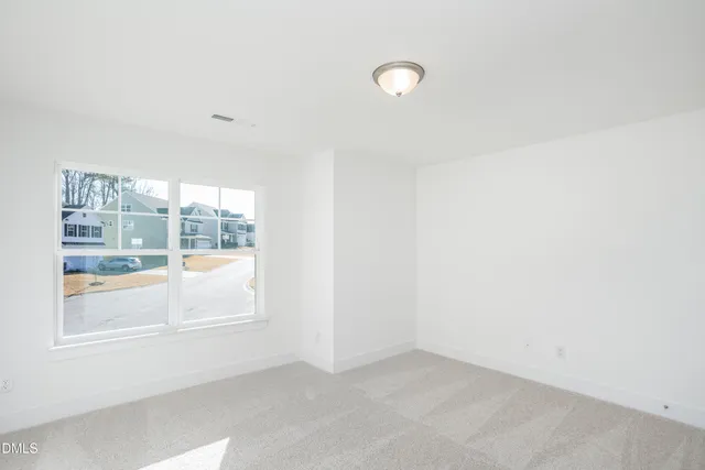 an empty room with window