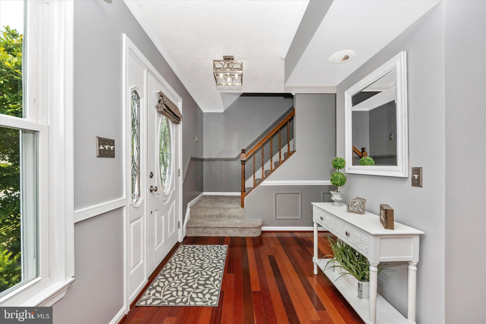 36 Winehurst Road Baltimore, MD 21228 - Photo 4 of 54 Foyer entrance with new light fixture
