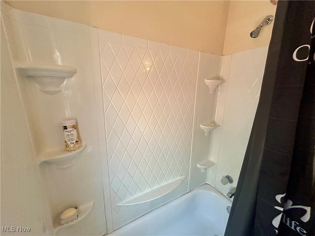 10202 Kinsman Road Cleveland, OH 44104 - Photo 9 of 15 Full bath featuring shower / bathtub combination with curtain