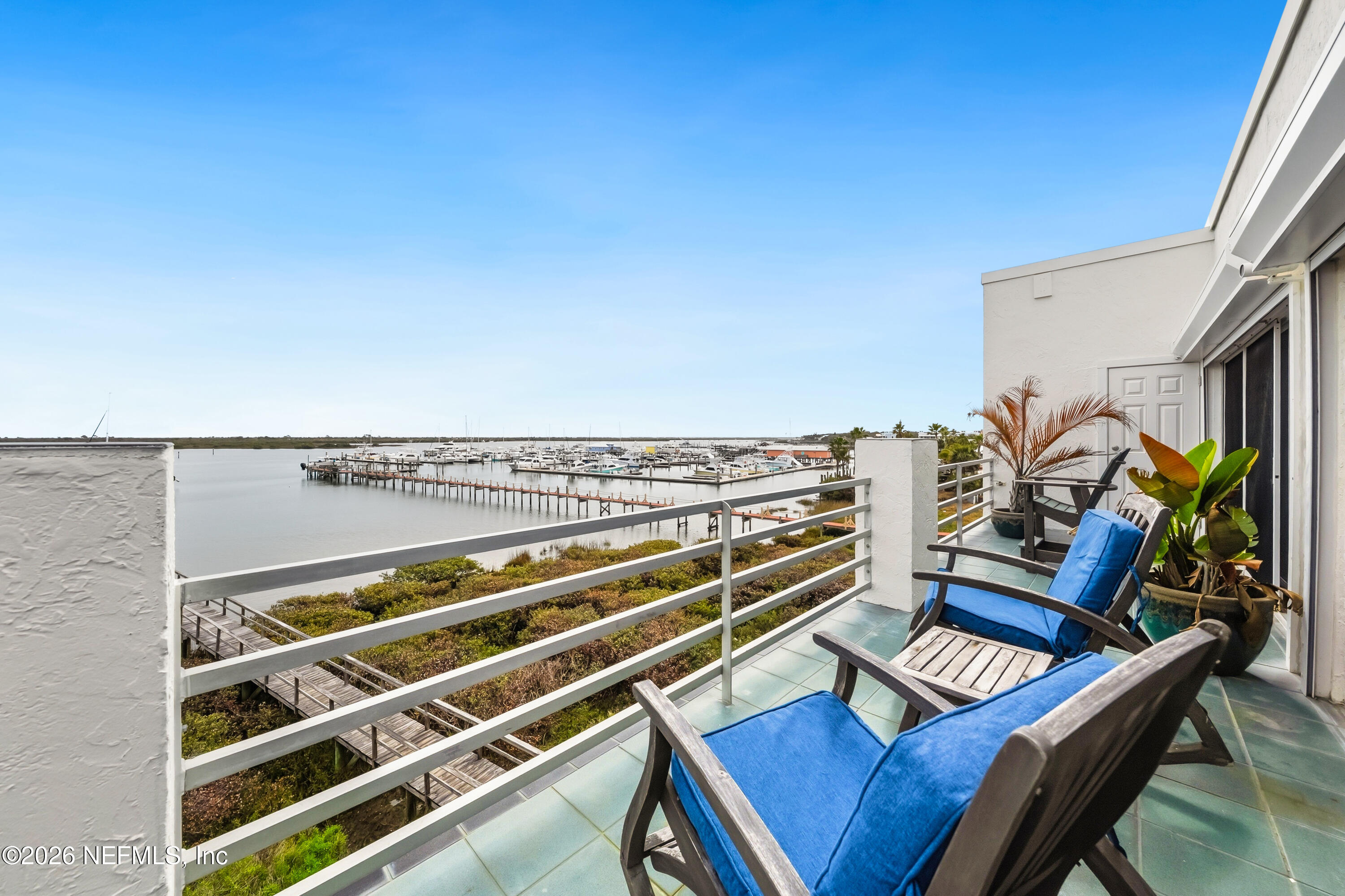 75 Comares Avenue, Unit 3A St. Augustine, FL 32080 - Photo 29 of 41 a view of a balcony with chairs