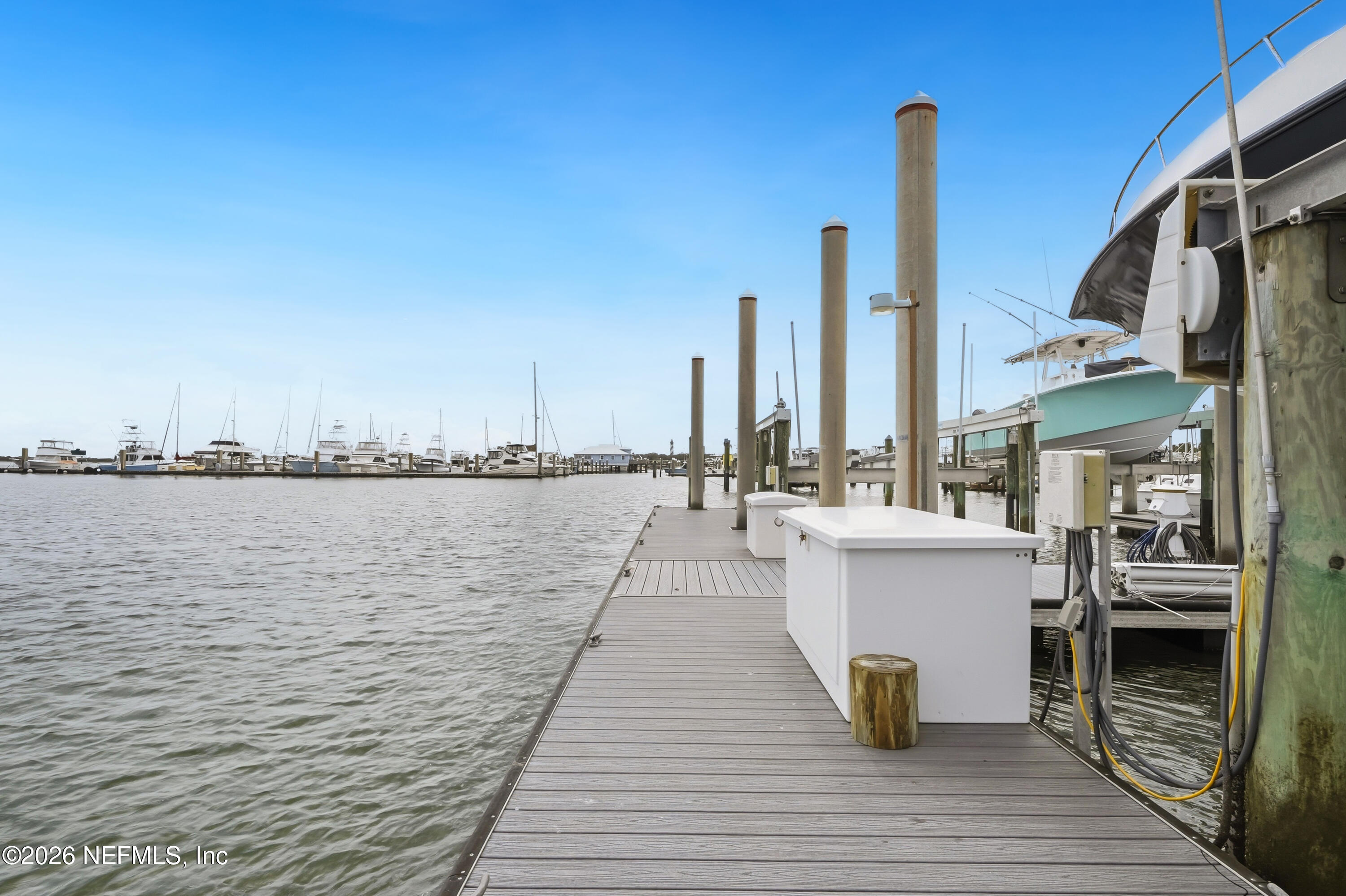 75 Comares Avenue, Unit 3A St. Augustine, FL 32080 - Photo 37 of 41 a roof deck with a table and chairs
