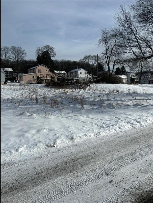 107-108 Mountain Man Road McIntyre, PA 15756 - Photo 3 of 5 a view of dirt yard with a barn