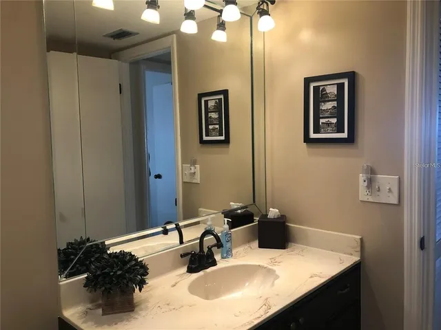 a view of a balcony with chairs