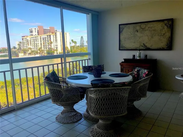 an aerial view of a house with a lake view