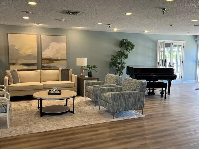 a room with a walk in closet and livingroom view