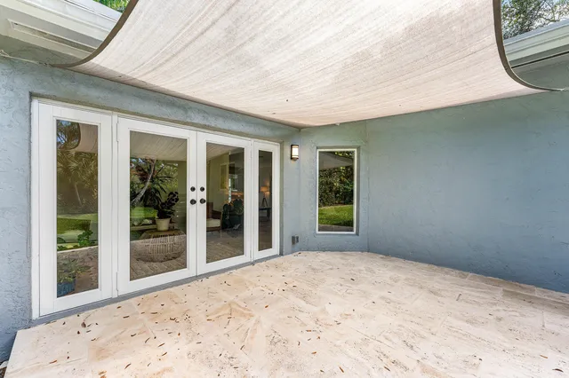 a view of a porch with a backyard