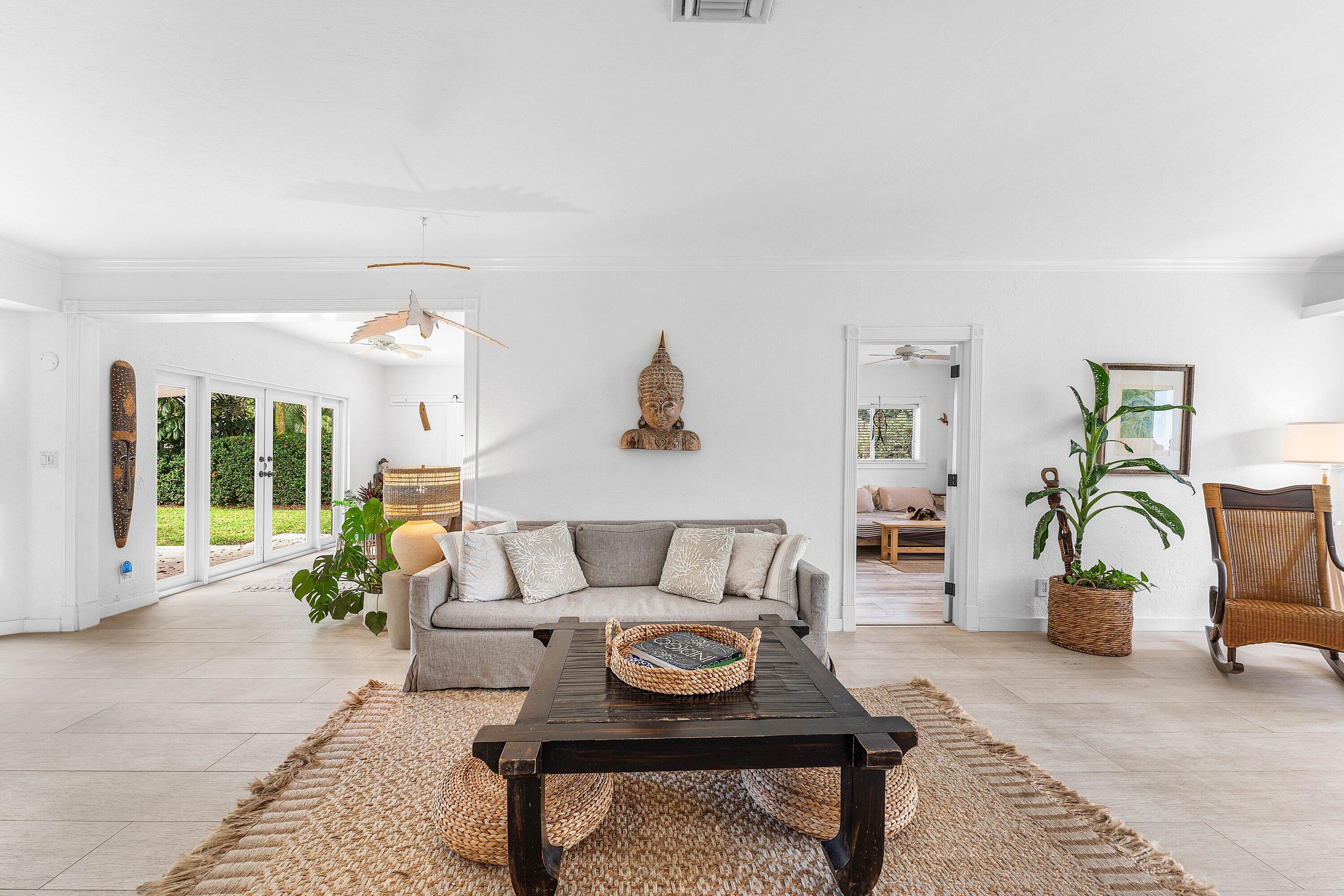 2573 Southwest 30th Terrace Fort Lauderdale, FL 33312 - Photo 22 of 44 a living room with furniture and a table