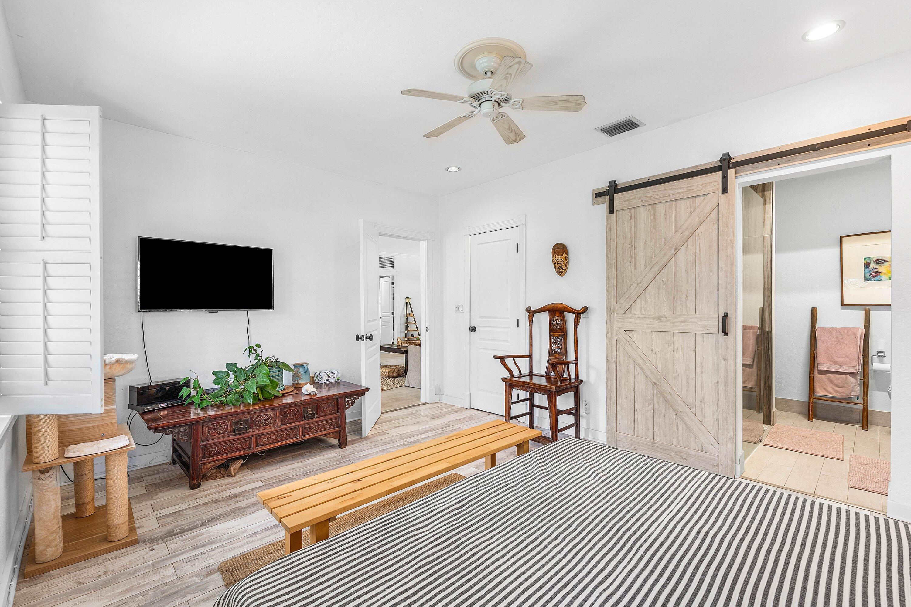 2573 Southwest 30th Terrace Fort Lauderdale, FL 33312 - Photo 37 of 44 a living room with furniture and a flat screen tv