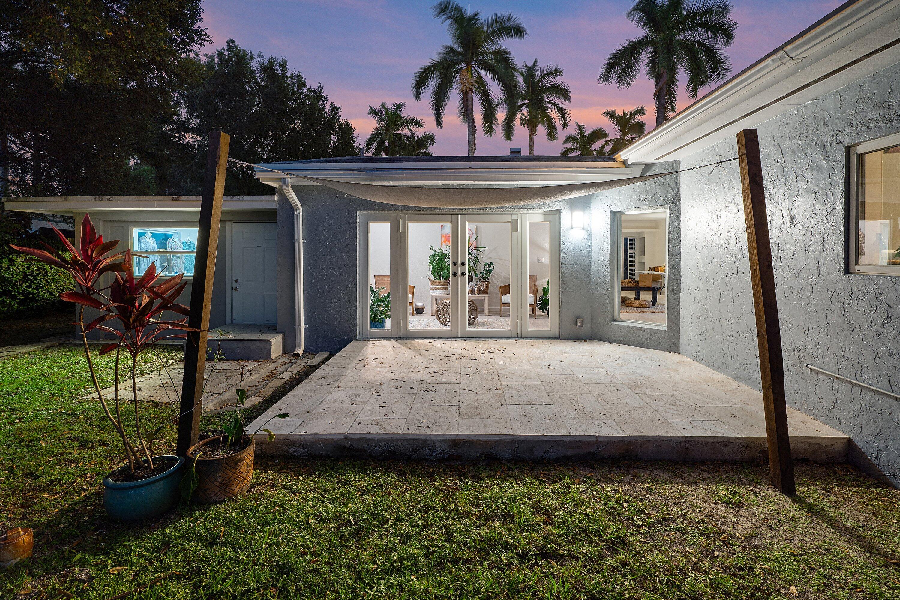 2573 Southwest 30th Terrace Fort Lauderdale, FL 33312 - Photo 5 of 44 a view of a porch with furniture and yard