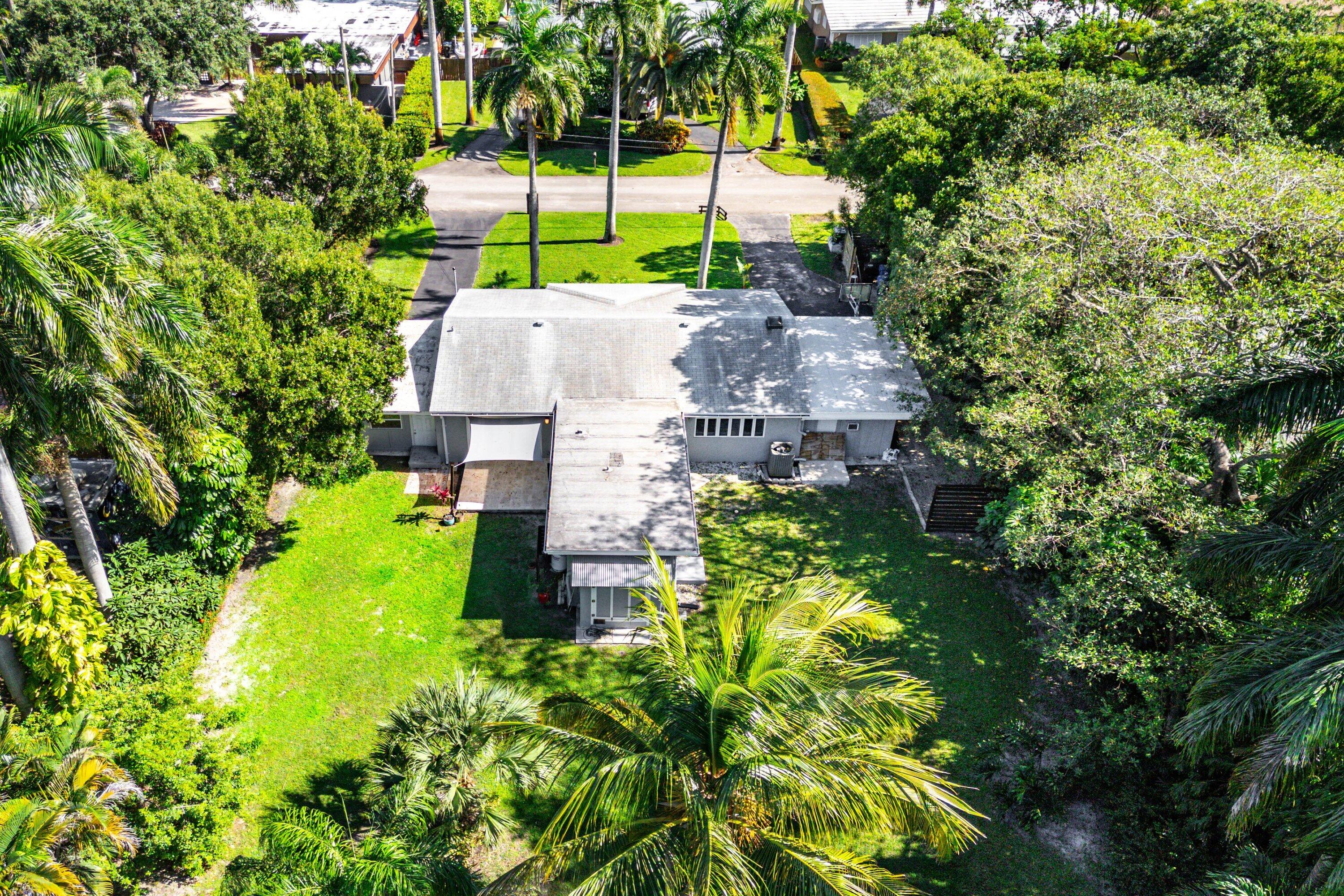 2573 Southwest 30th Terrace Fort Lauderdale, FL 33312 - Photo 8 of 44 a view of a garden with a small yard