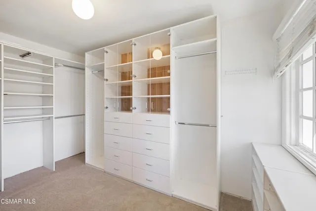 a view of an empty walk in closet