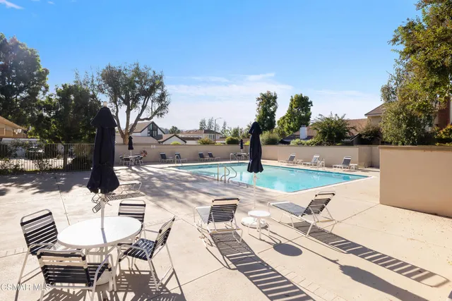 a view of a terrace with sitting area