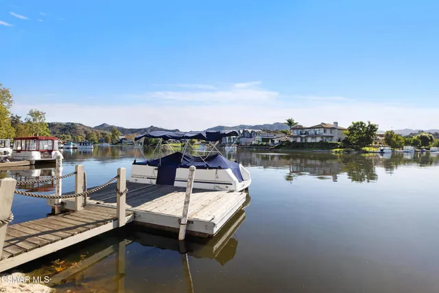 a view of a lake with couches