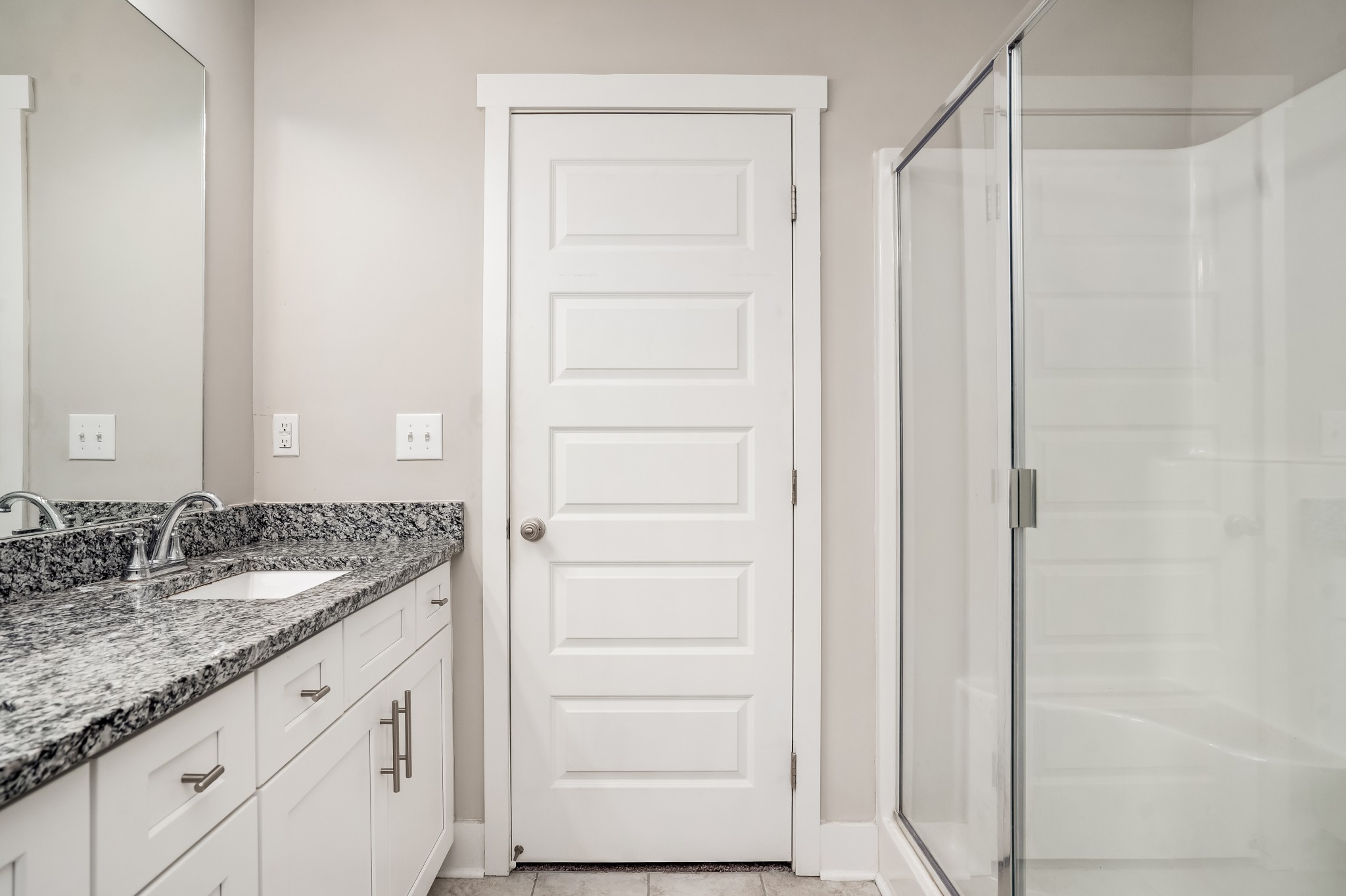 4012 Angelica Ct Spring Hill, Unit 4012 Spring Hill, TN 37174 - Photo 11 of 12 a bathroom with a granite countertop sink and a mirror