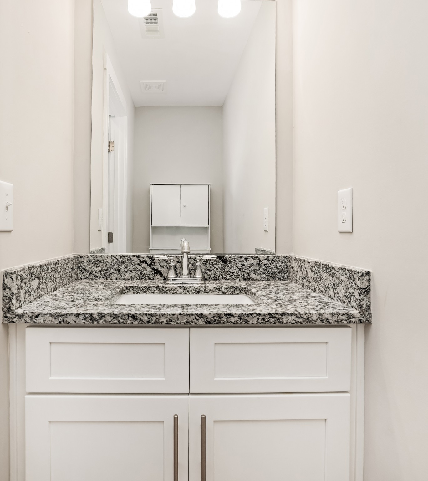 4012 Angelica Ct Spring Hill, Unit 4012 Spring Hill, TN 37174 - Photo 6 of 12 a bathroom with a granite countertop and white sink