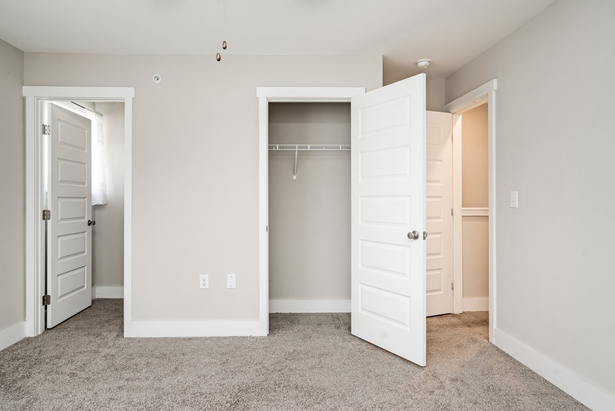4012 Angelica Ct Spring Hill, Unit 4012 Spring Hill, TN 37174 - Photo 9 of 12 an empty room with closet and mirrors