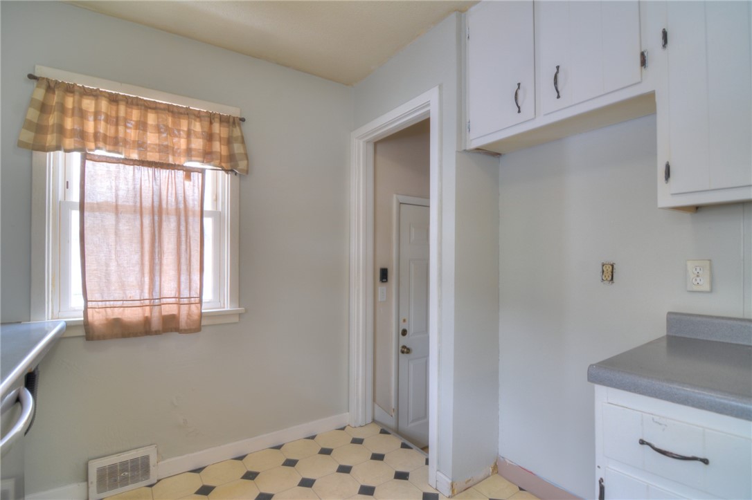 47 1st South Shores Avenue Decatur, IL 62521 - Photo 17 of 24 a room with window and cabinet
