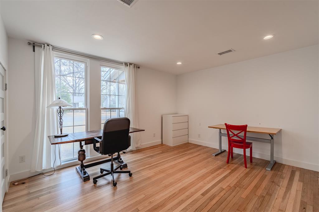 8927 Diceman Drive Dallas, TX 75218 - Photo 22 of 33 a workspace with furniture and a window
