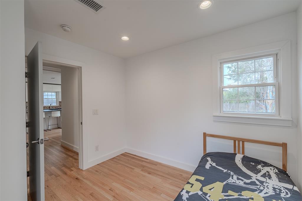 8927 Diceman Drive Dallas, TX 75218 - Photo 23 of 33 a workspace with wooden floor and a window