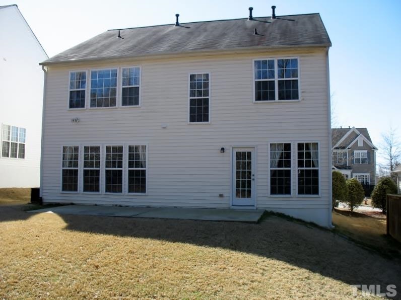 5328 Shaker Heights Lane Raleigh, NC 27613 - Photo 3 of 25 a front view of a house with a yard