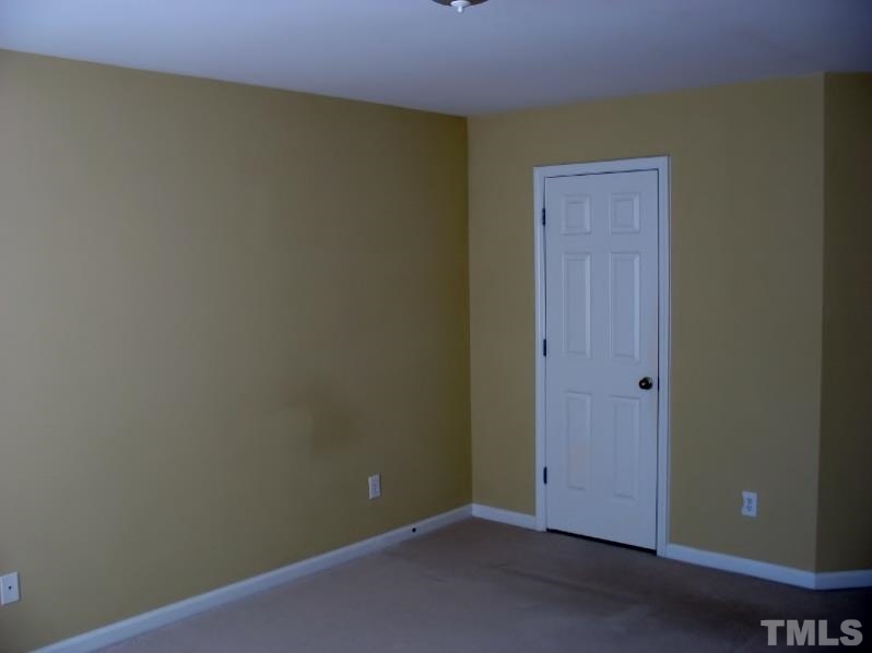 5328 Shaker Heights Lane Raleigh, NC 27613 - Photo 25 of 25 an empty room with closet