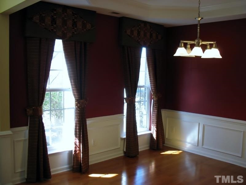 5328 Shaker Heights Lane Raleigh, NC 27613 - Photo 8 of 25 a view of a livingroom with a staircase
