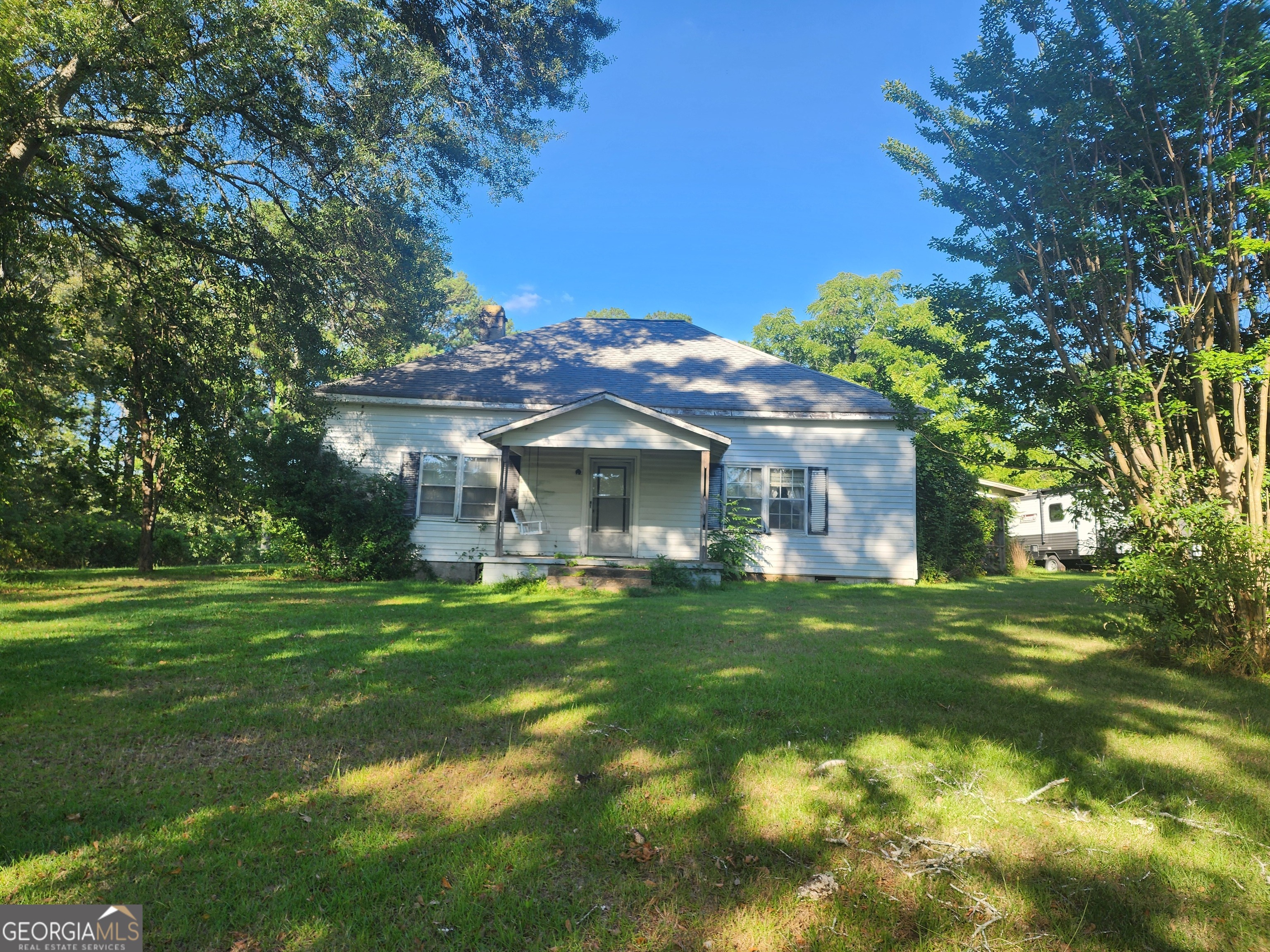 433 Mt Moriah Road Auburn, GA 30011 - Photo 9 of 9 a front view of a house with a garden