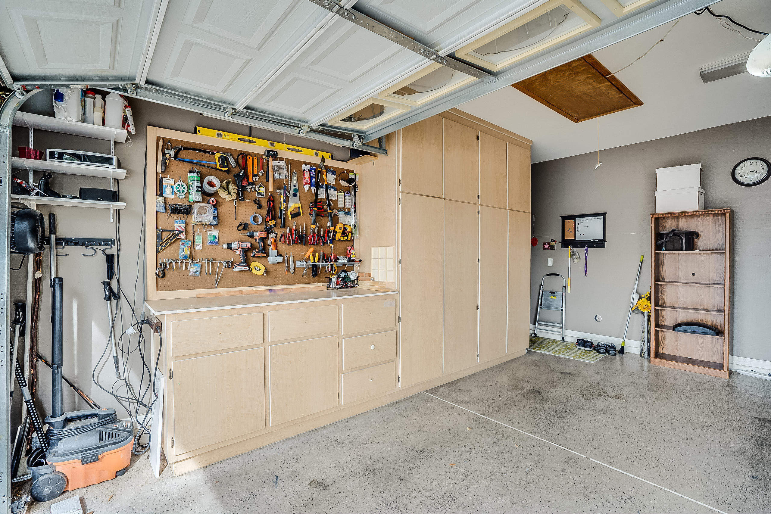 3404 West Florimond Road Phoenix, AZ 85086 - Photo 33 of 40 Built In Storage Cabinets and Work Area!