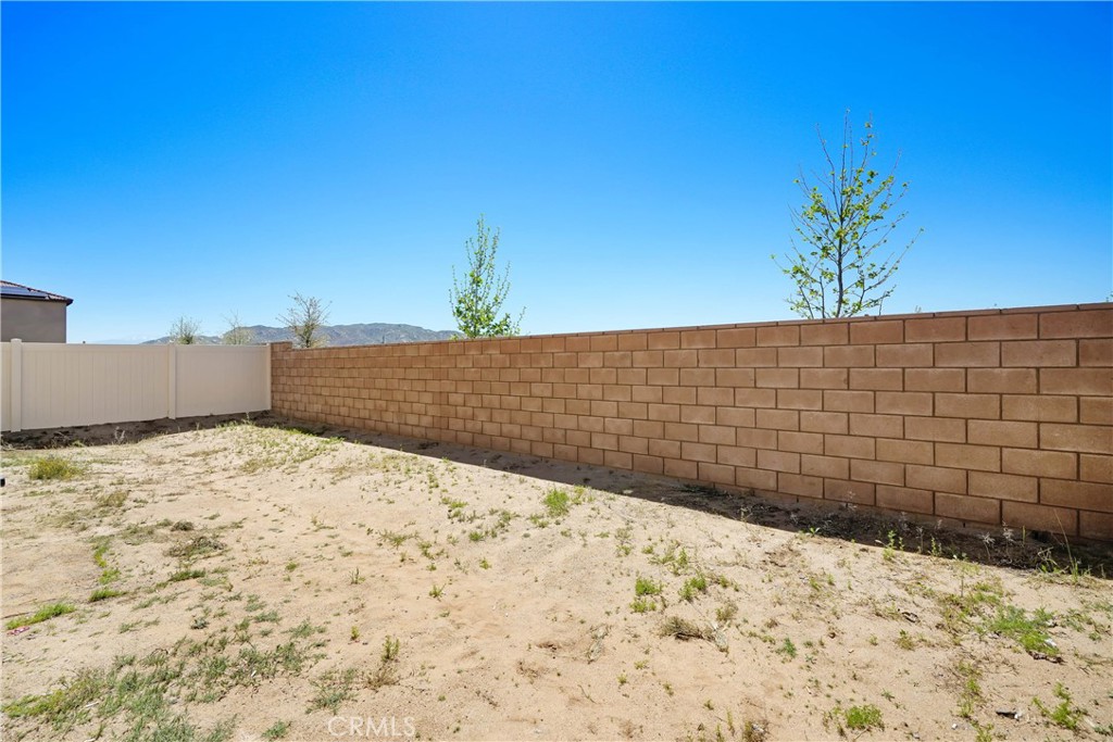 24871 Tiger Avenue Moreno Valley, CA 92551 - Photo 13 of 13 a view of wooden fence and snow