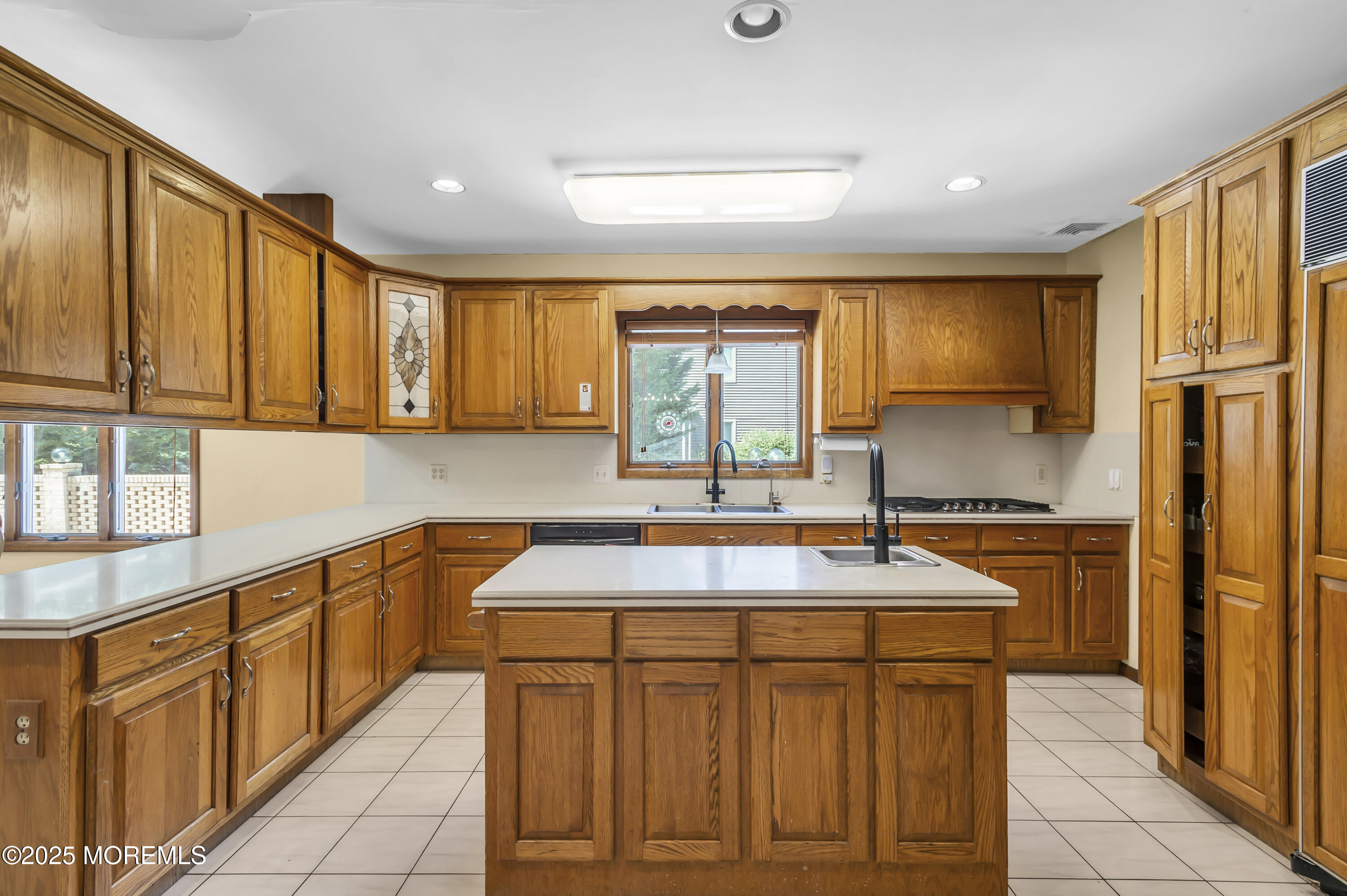 1350 Church Road Toms River, NJ 08755 - Photo 17 of 52 a kitchen with stainless steel appliances granite countertop a sink stove and refrigerator