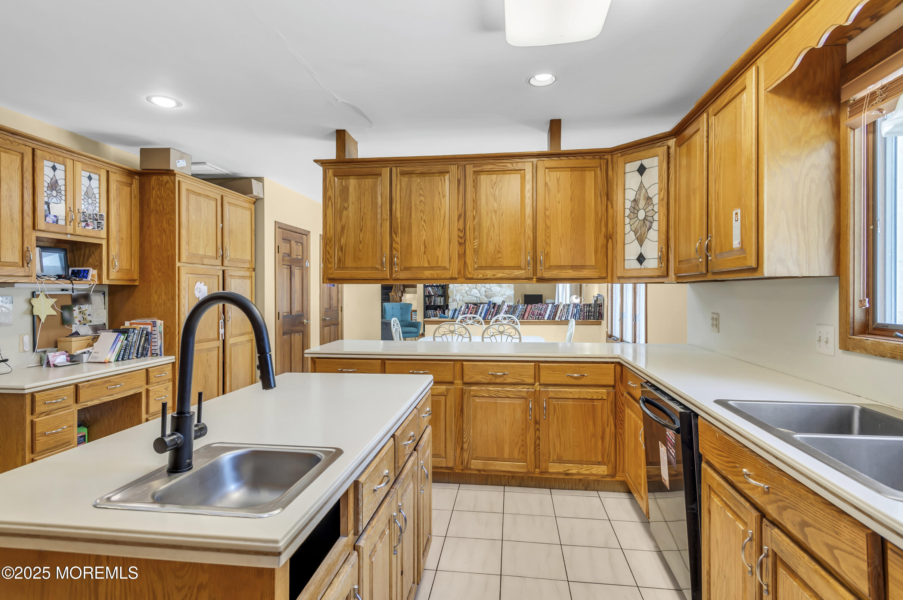 1350 Church Road Toms River, NJ 08755 - Photo 18 of 52 a kitchen with a sink a counter top space cabinets a stove and a window