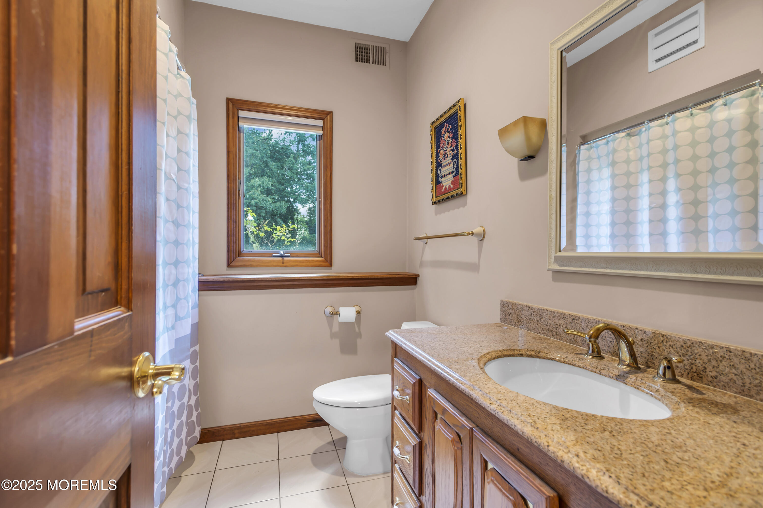1350 Church Road Toms River, NJ 08755 - Photo 27 of 52 a bathroom with a granite countertop sink and a mirror